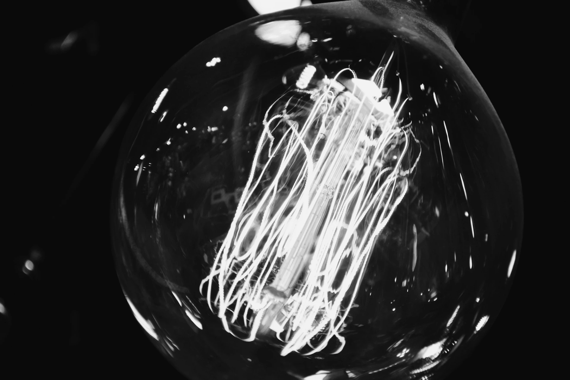 A black and white photo of a light bulb
