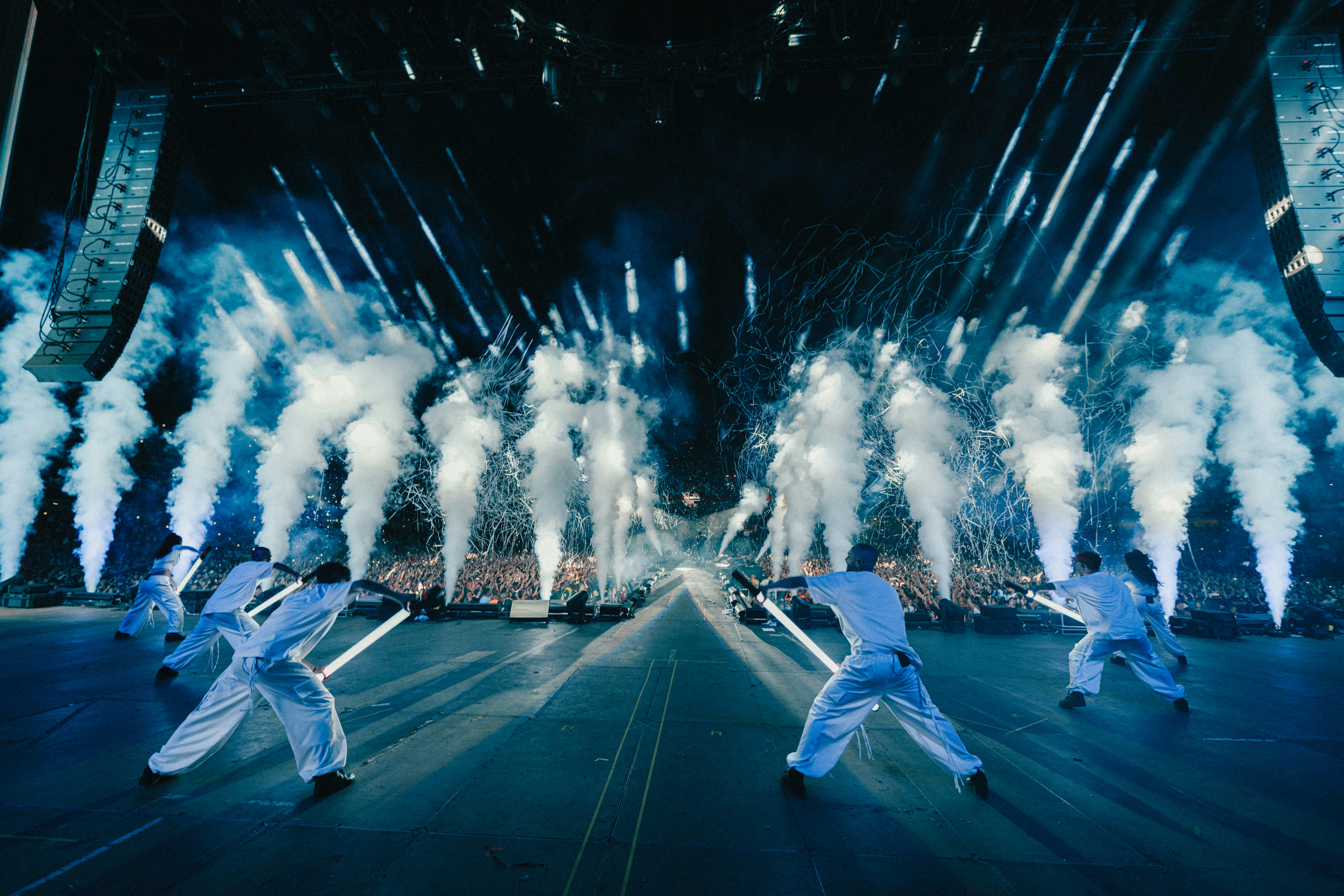 A group of dancers performing on a stage