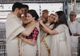A couple of people that are hugging each other