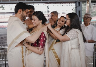 A couple of people that are hugging each other