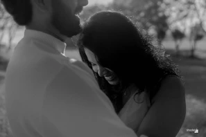 A man holding a woman in his arms