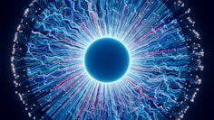 A close up of a blue eyeball in the dark