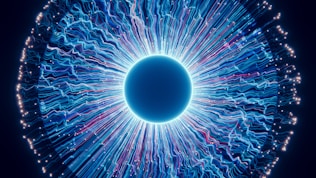 A close up of a blue eyeball in the dark