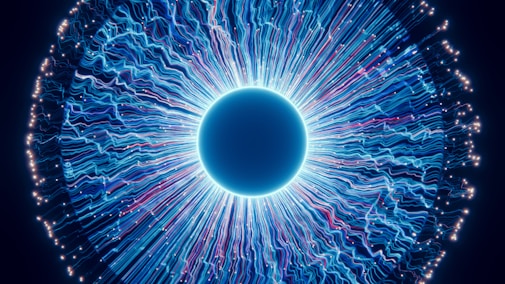 A close up of a blue eyeball in the dark