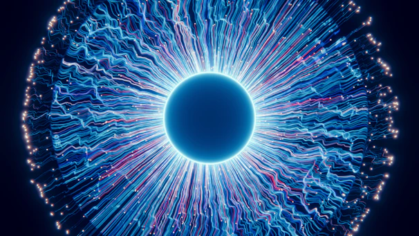 A close up of a blue eyeball in the dark