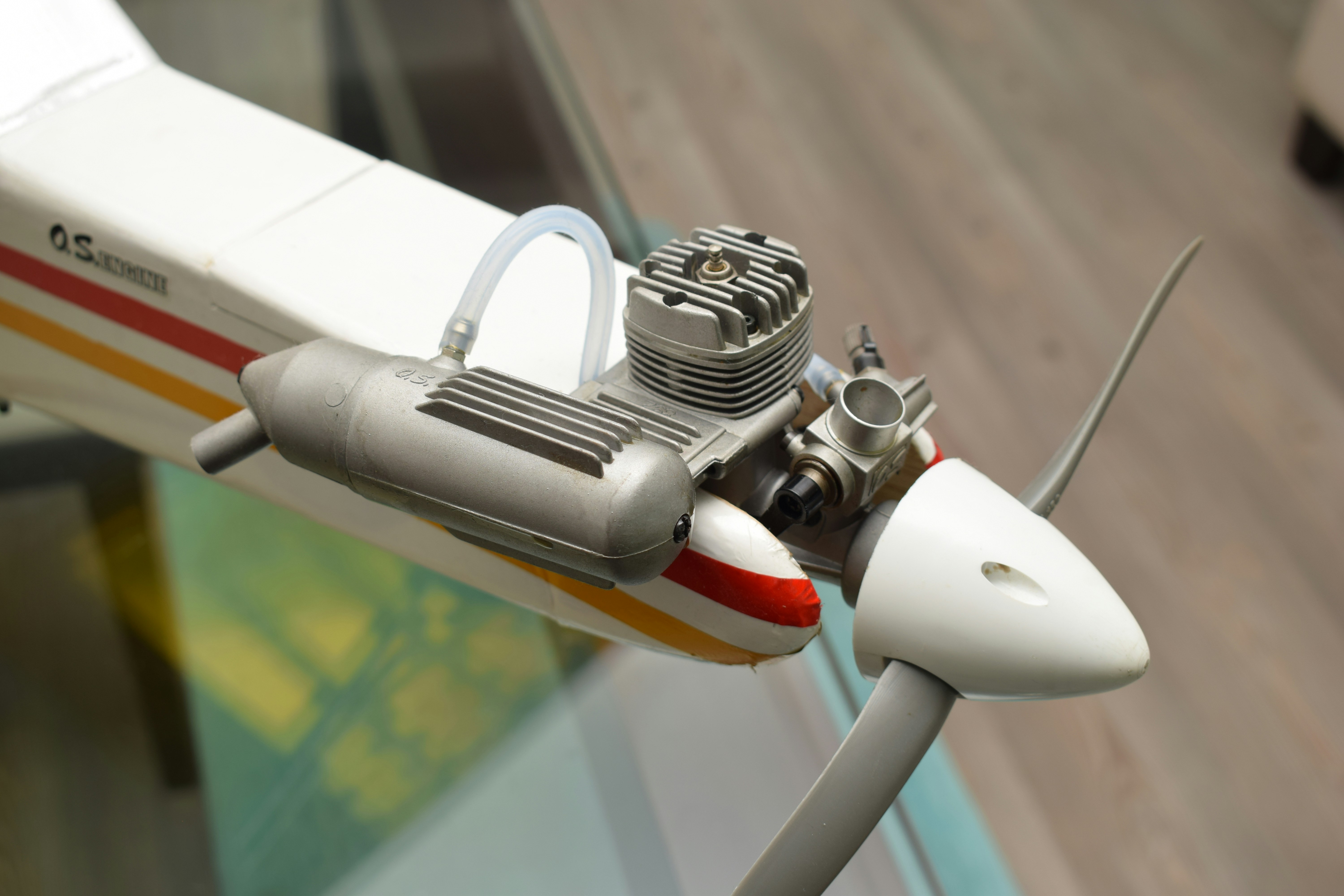 A toy airplane is on display on a table