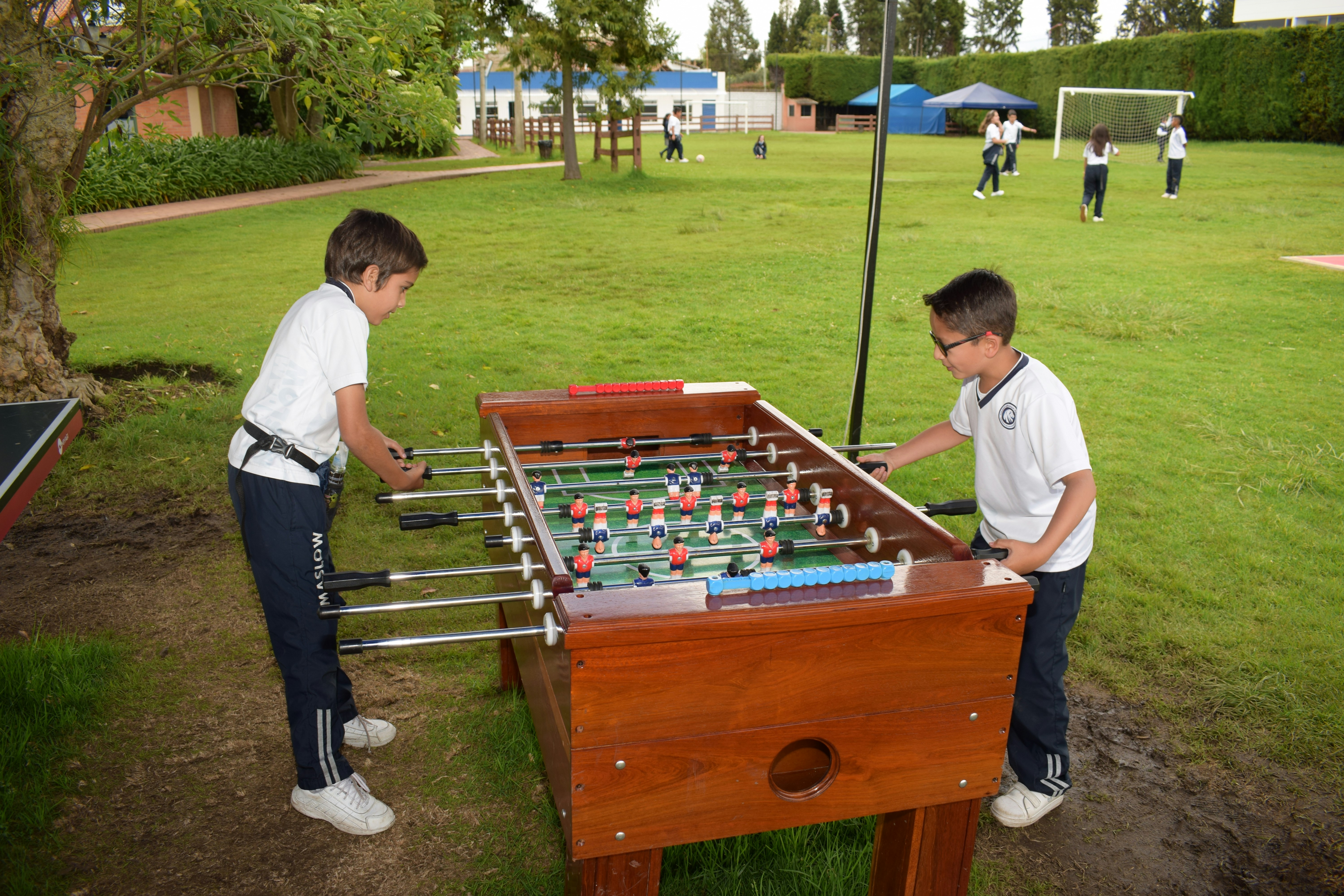 Two young boys playing a game of foo foo