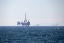 An oil rig in the middle of the ocean