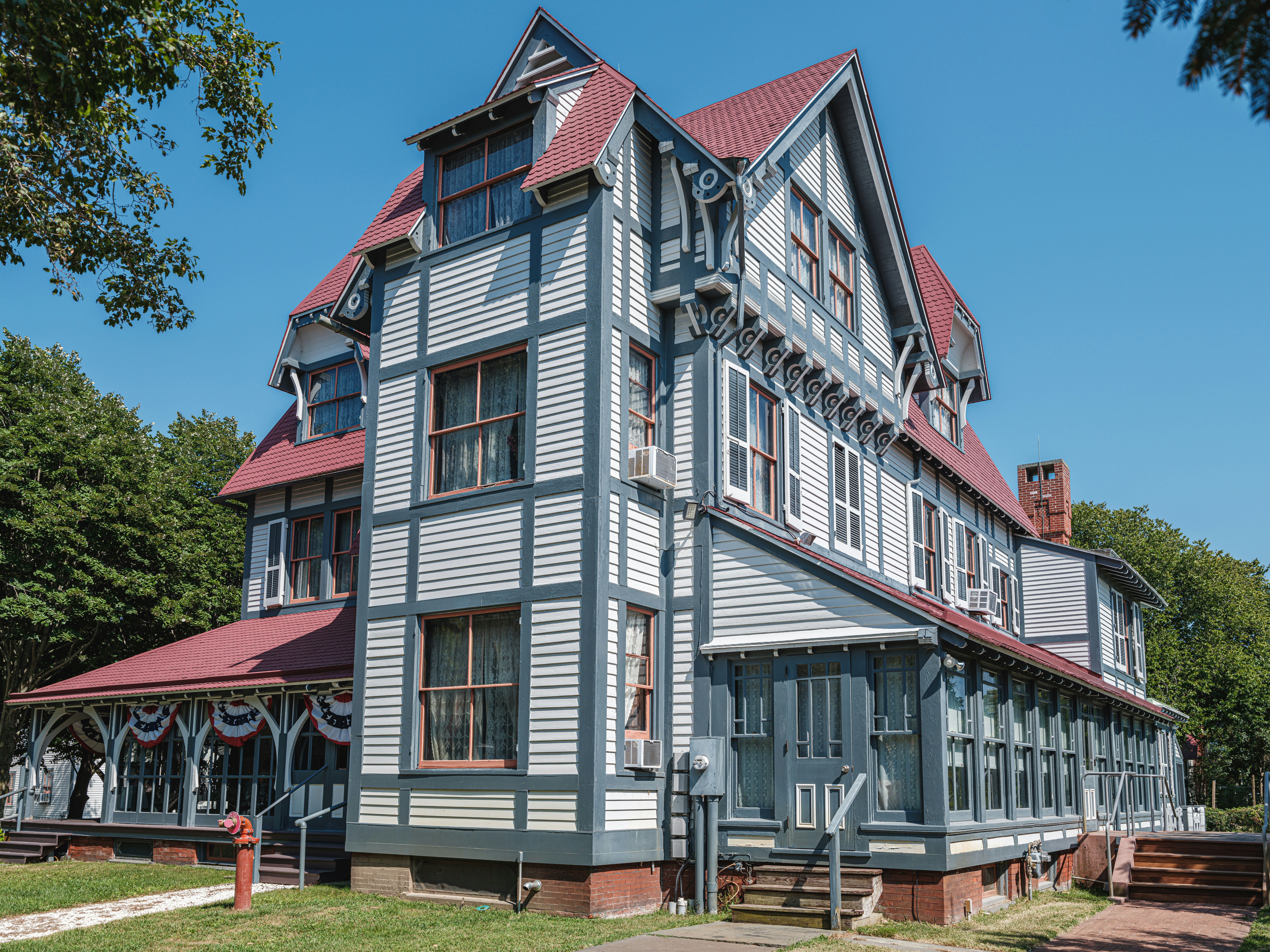 woman wearing yellow long-sleeved dress under white clouds and blue sky during daytime