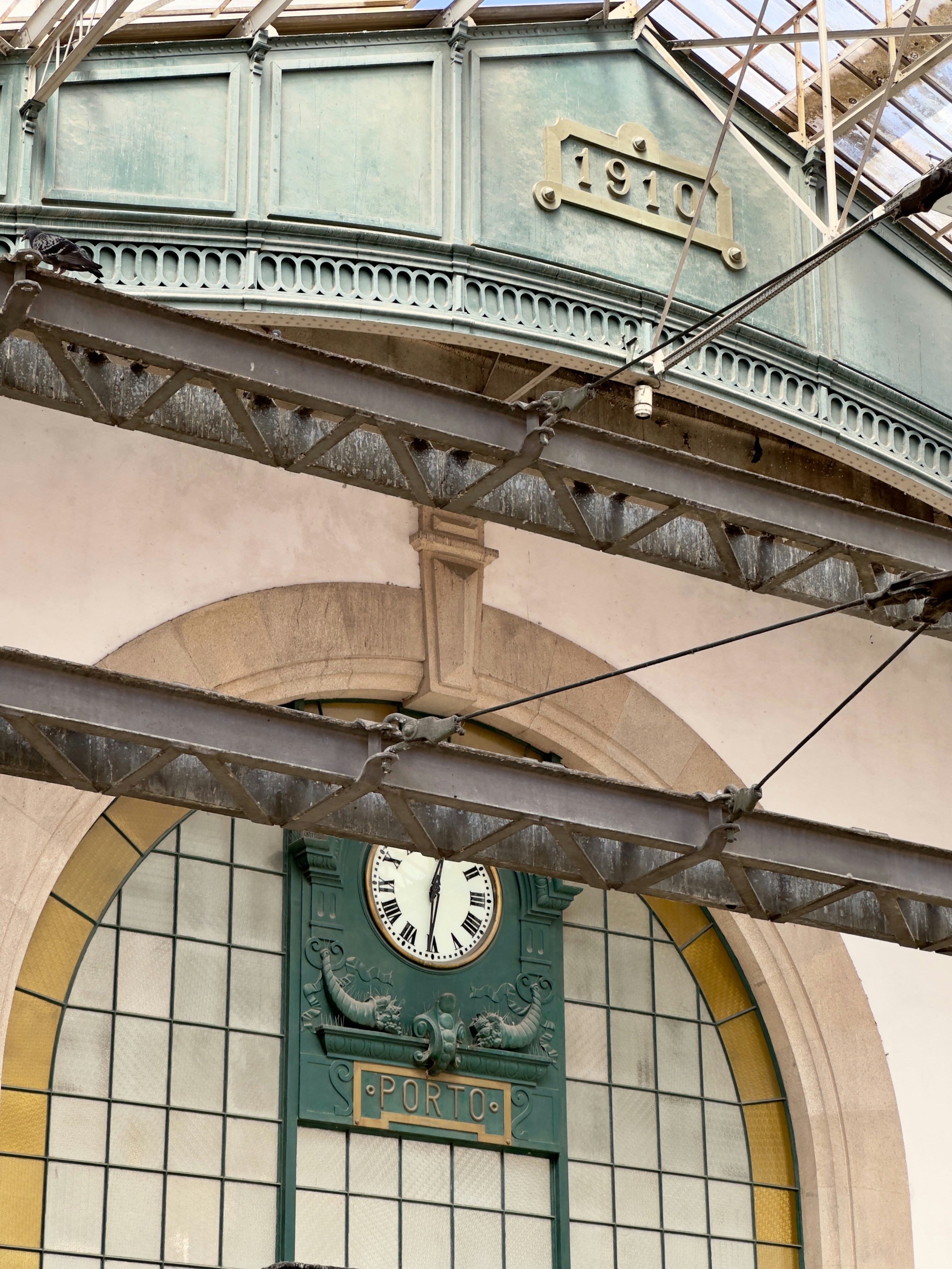 A clock mounted to the side of a building