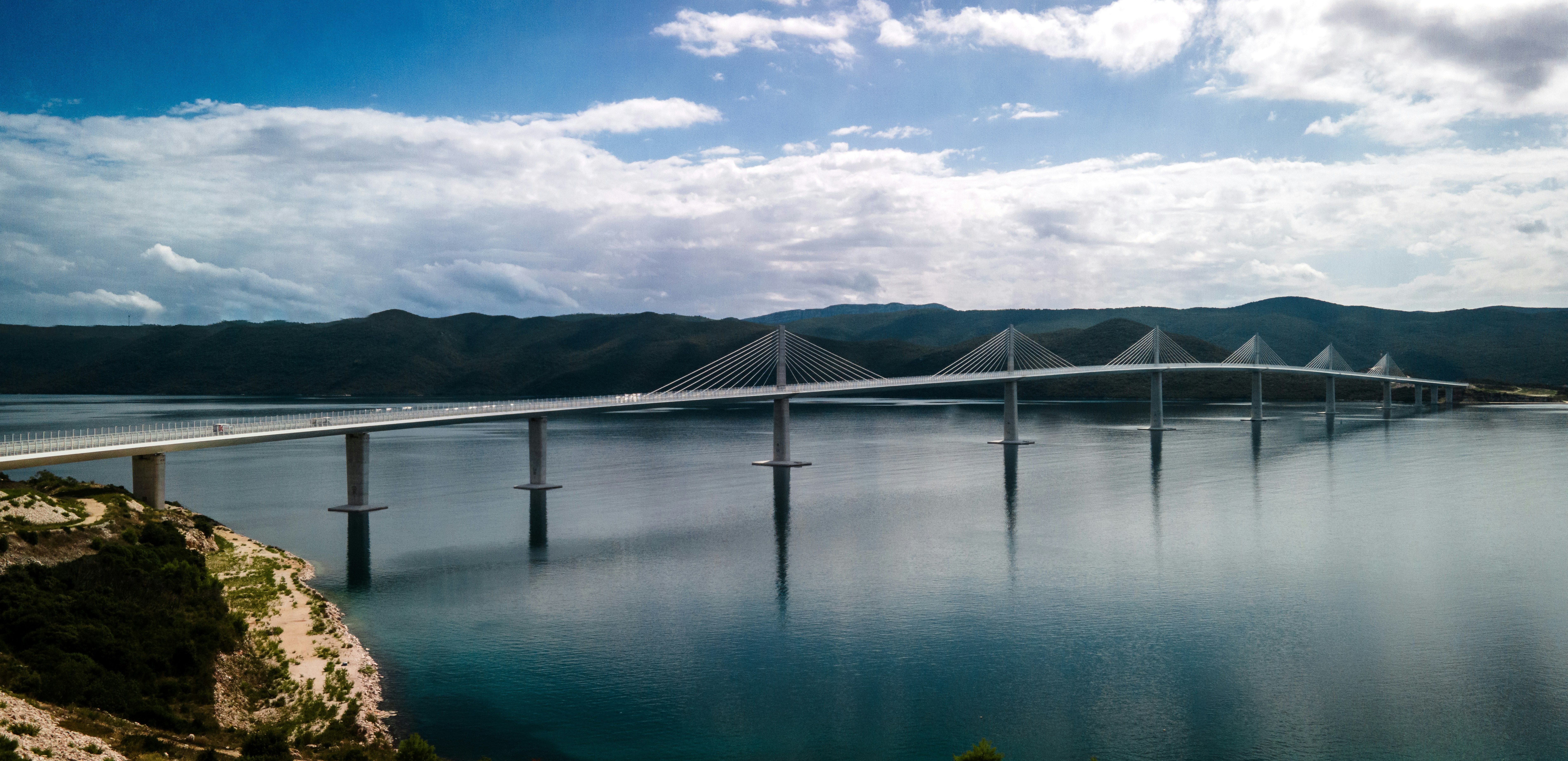 A large bridge spanning over a large body of water