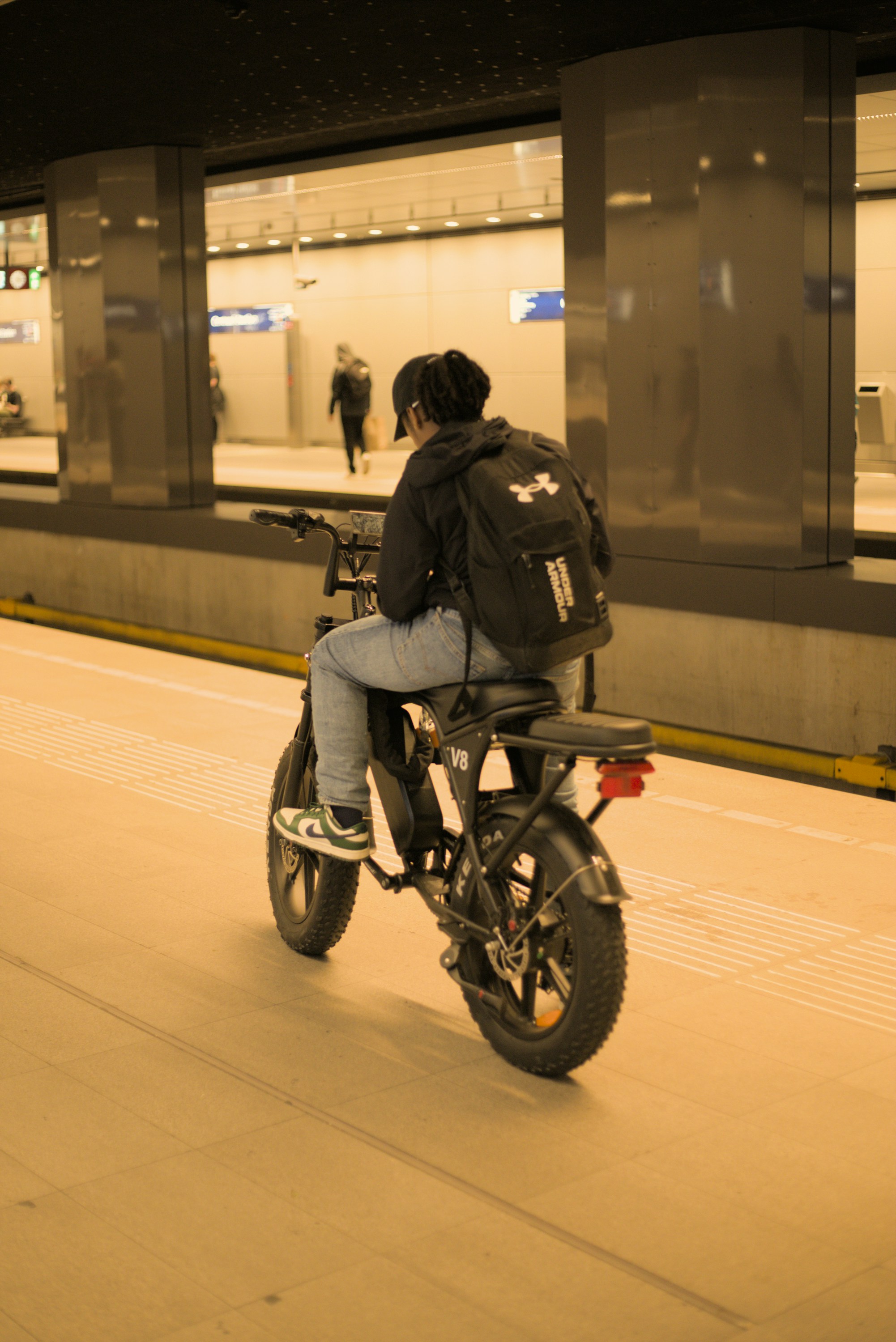 A person riding a bike on a platform