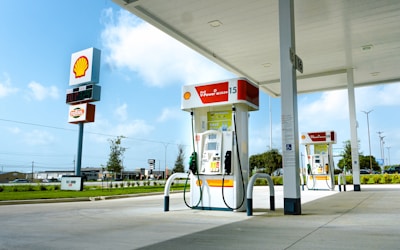 A gas station with a few gas pumps
