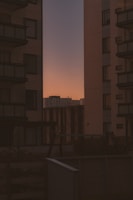 A tall building with a sky in the background