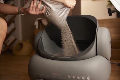 A woman in a silver dress is washing her feet