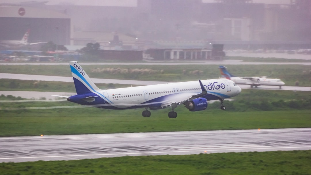 A large jetliner taking off from an airport runway,