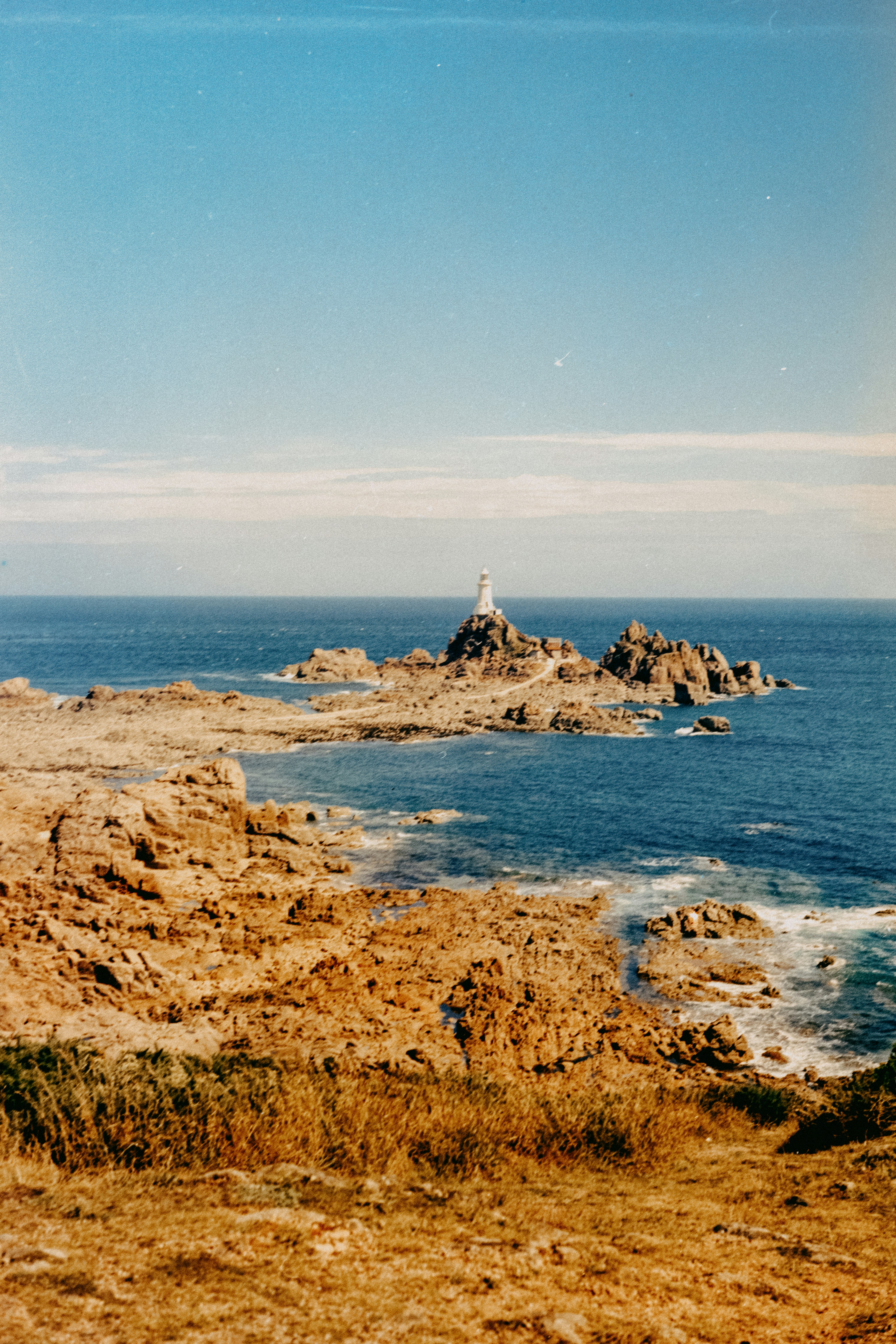 A view of the ocean from a rocky shore