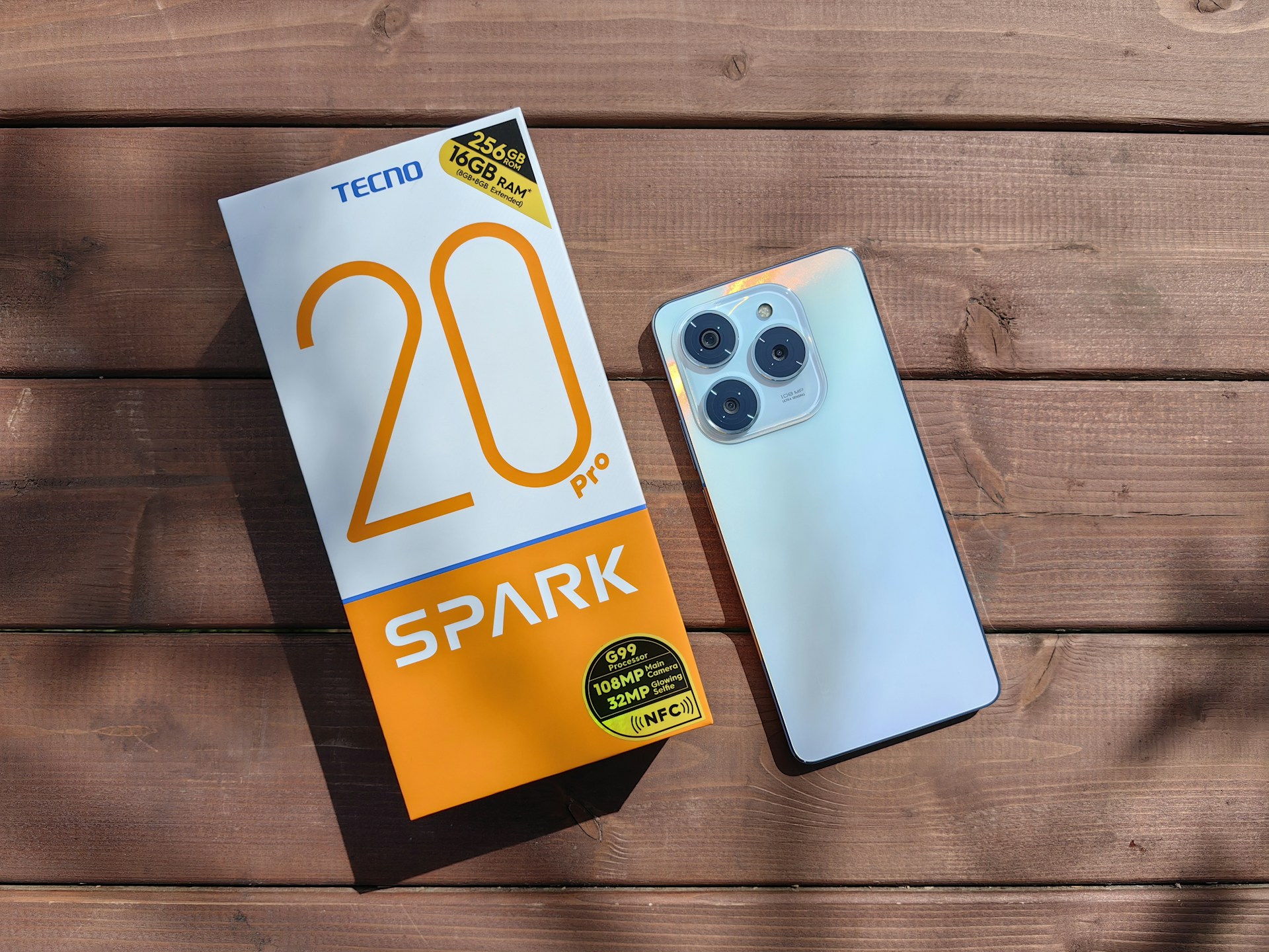 A box of spark next to a remote control