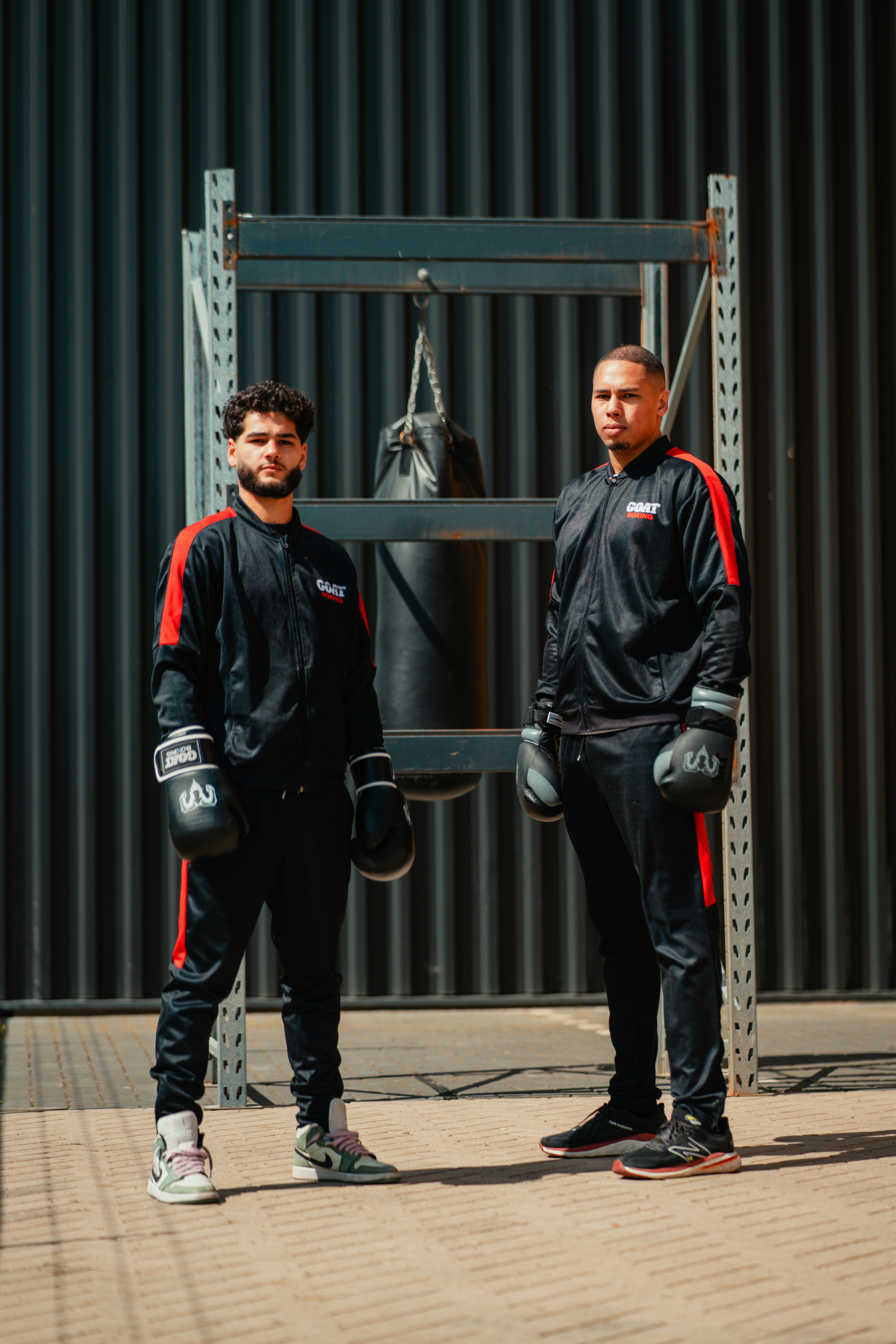 A couple of men standing next to each other