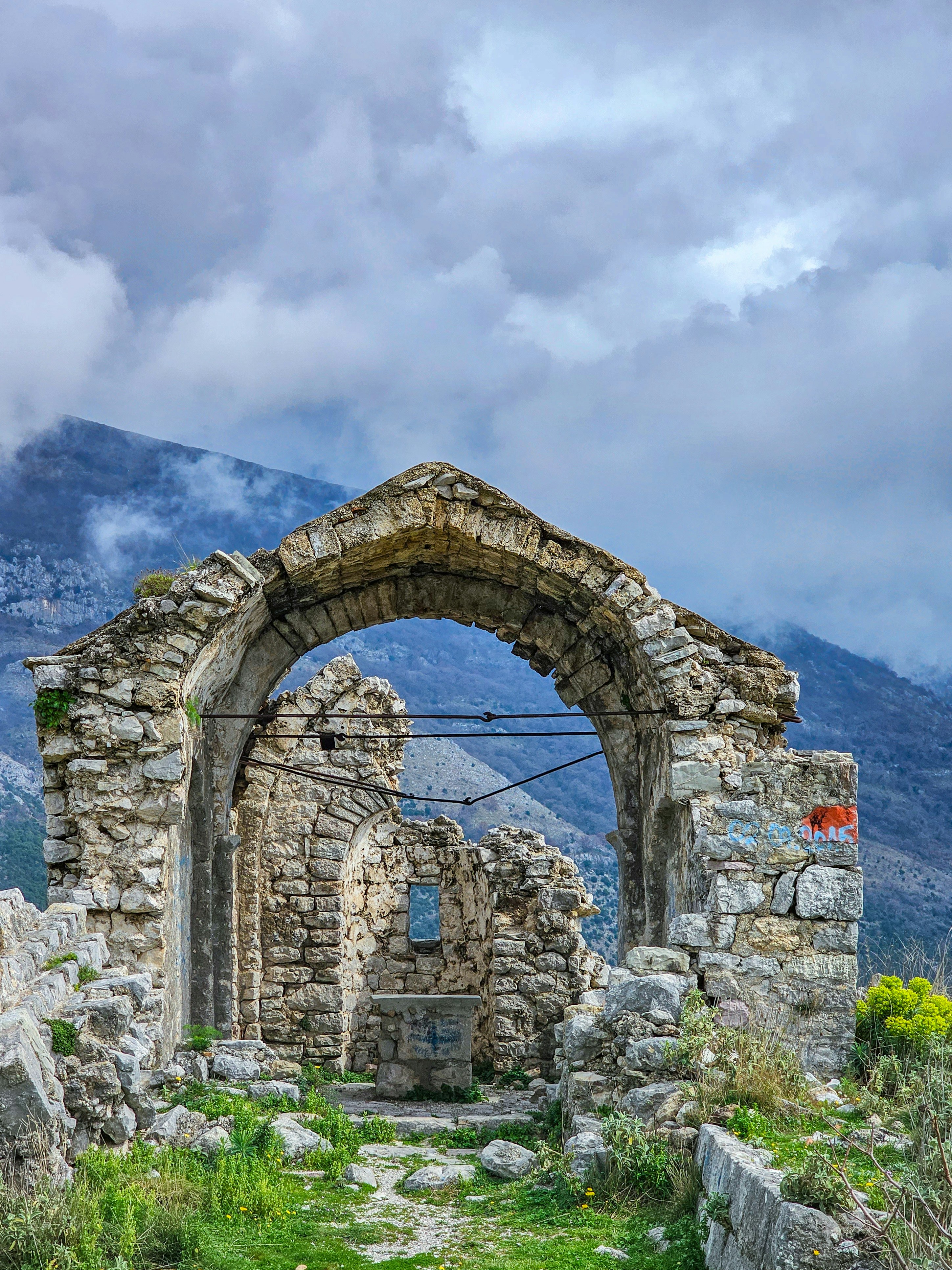 An old stone building with an arched doorway