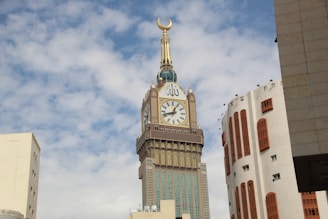 A tall clock tower towering over a city