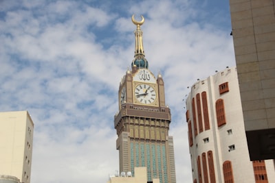 A tall clock tower towering over a city