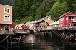 A row of houses sitting next to a body of water