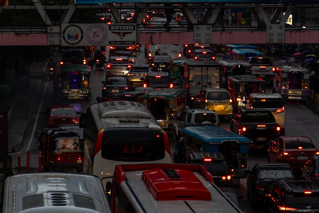 A busy city street filled with lots of traffic