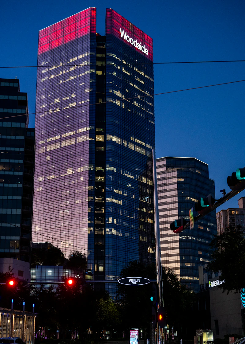 Houston trade expo venue - A very tall building sitting in the middle of a city