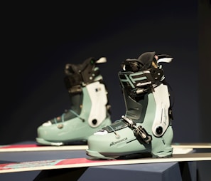 A pair of ski boots sitting on top of a table