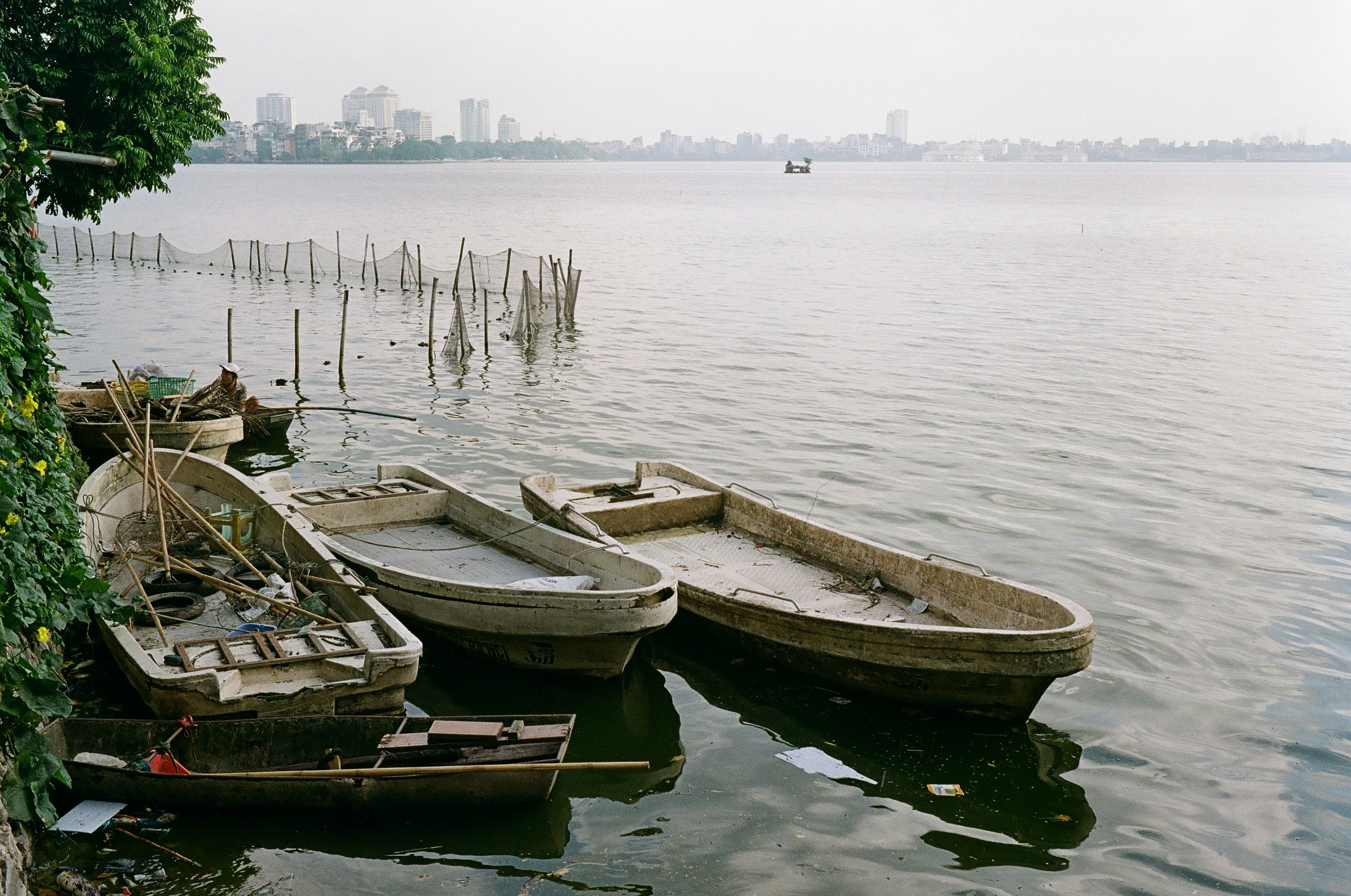A couple of boats that are sitting in the water