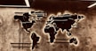 A picture of a world map on a wall
