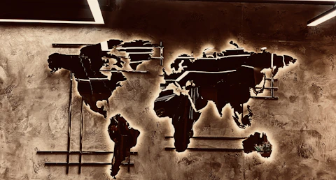 A picture of a world map on a wall