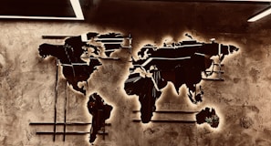 A picture of a world map on a wall