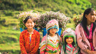 A group of people standing next to each other