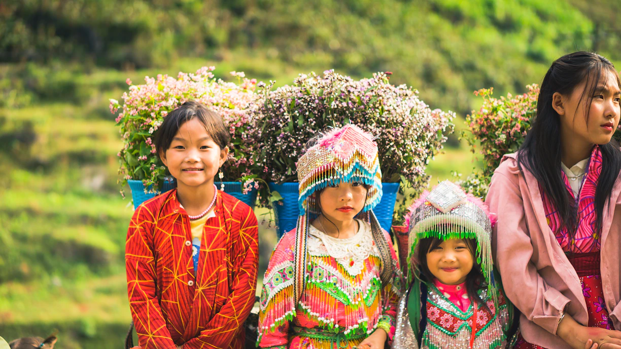A group of people standing next to each other