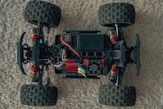 A close up of a toy car on a carpet