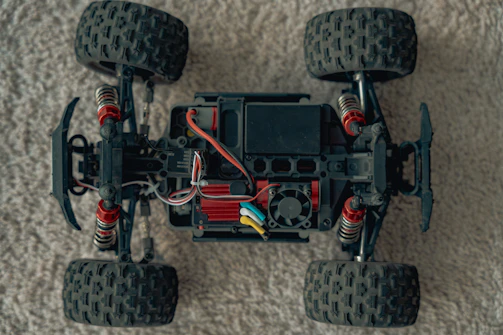 A close up of a toy car on a carpet