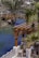 A view of a river with a bridge in the background