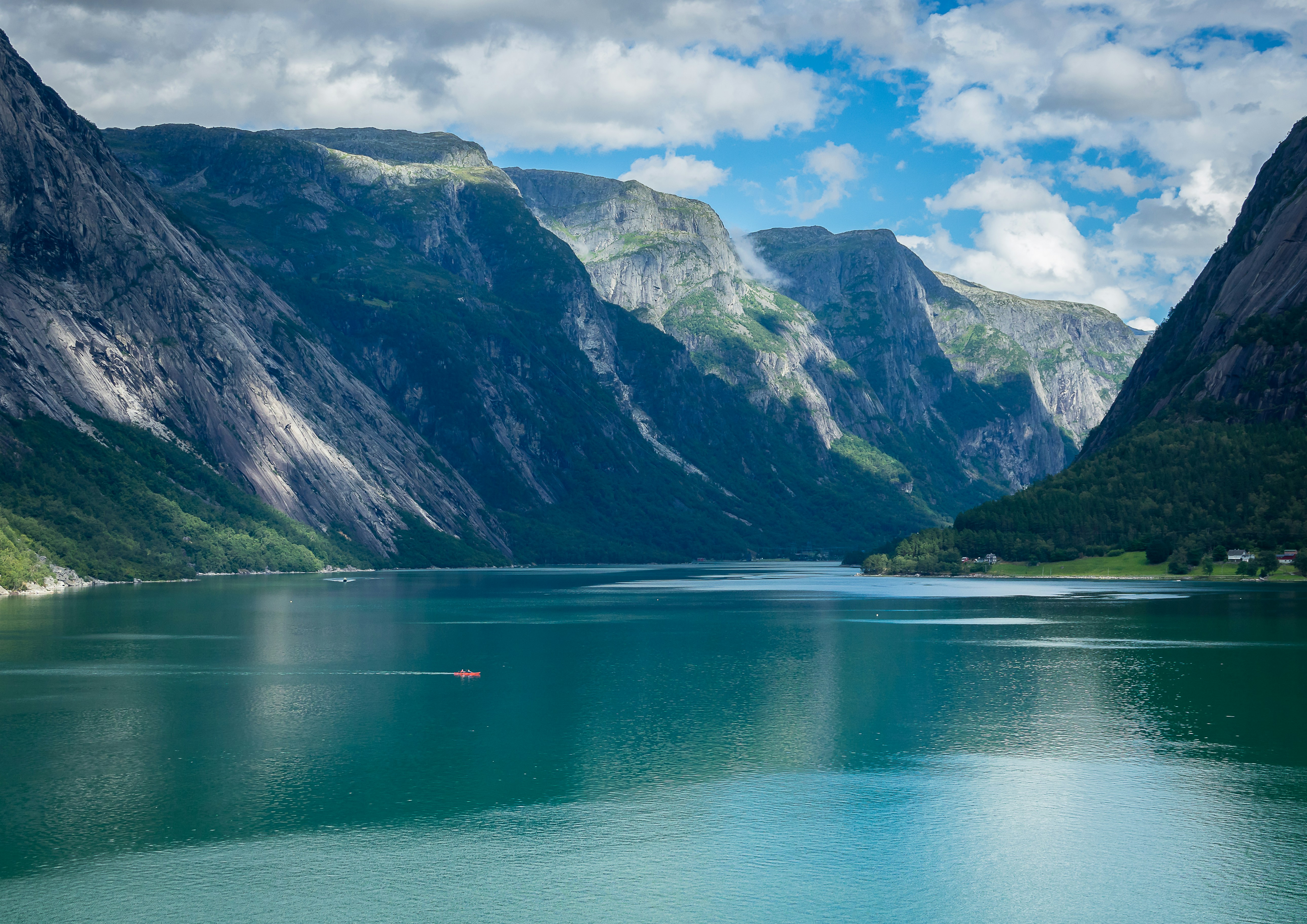 A large body of water surrounded by mountains