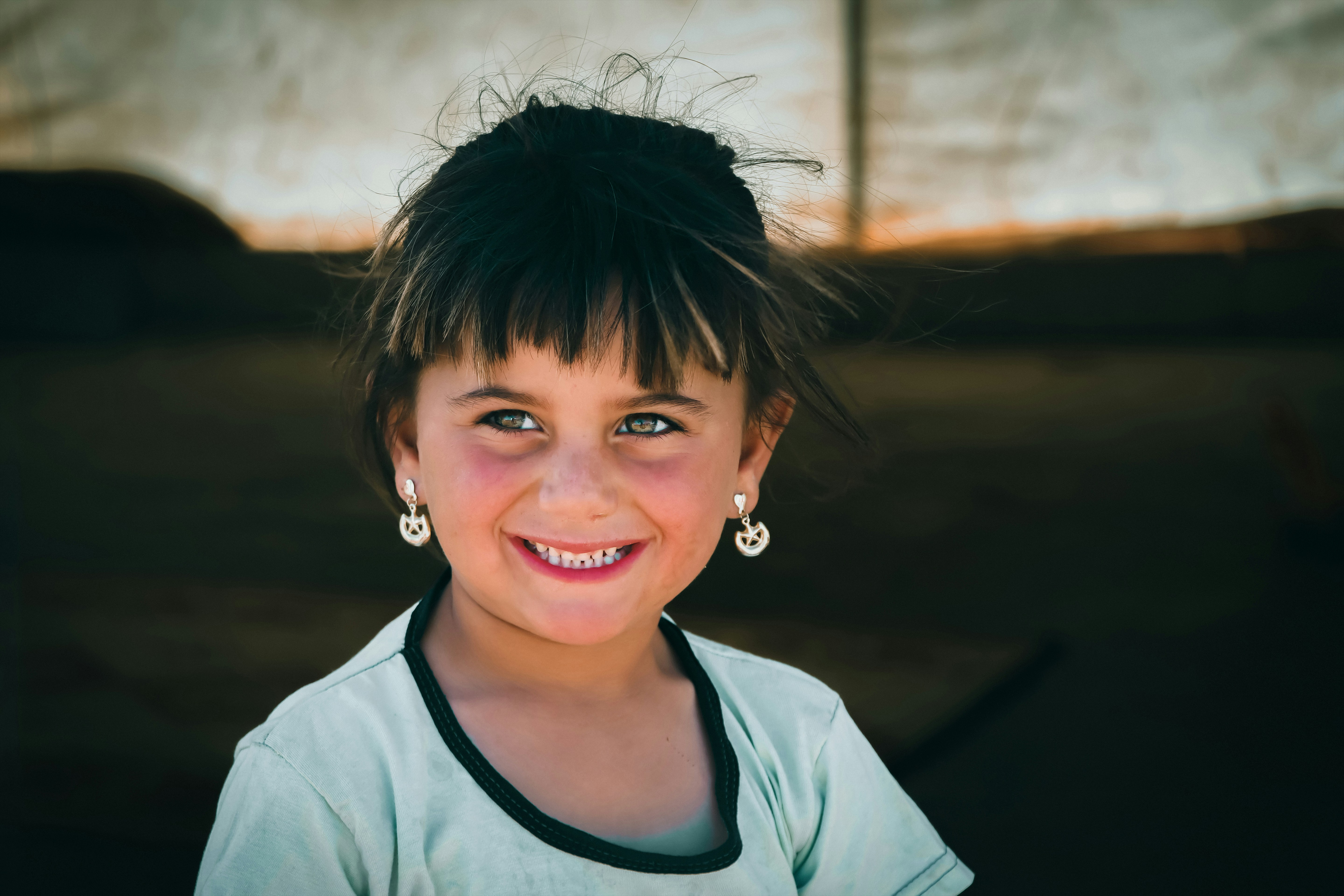 A little girl with a smile on her face