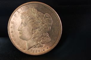 A close up of a coin on a table