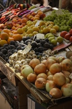 A bunch of fruit that are on a table