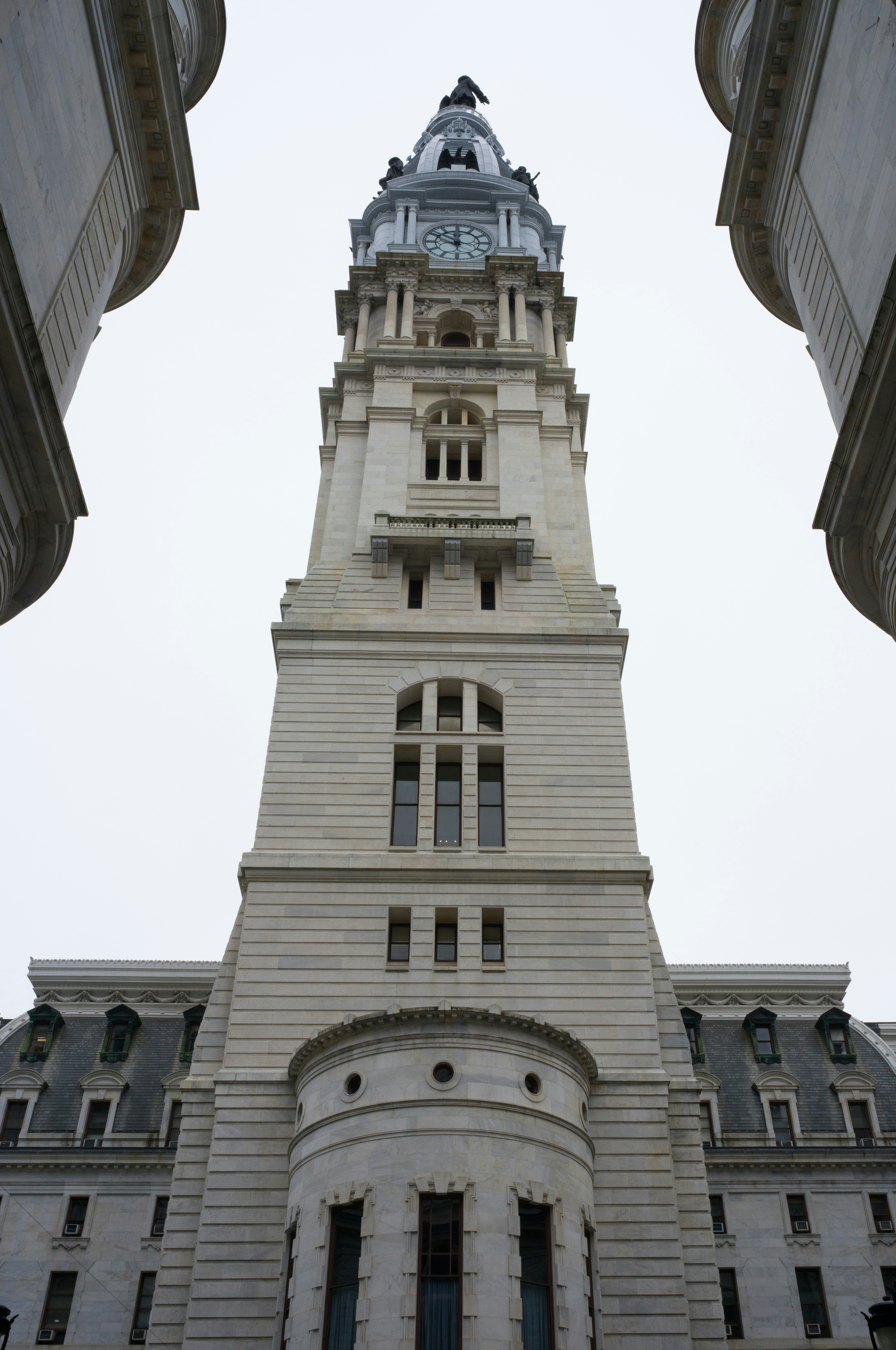 A tall building with a clock on the top of it