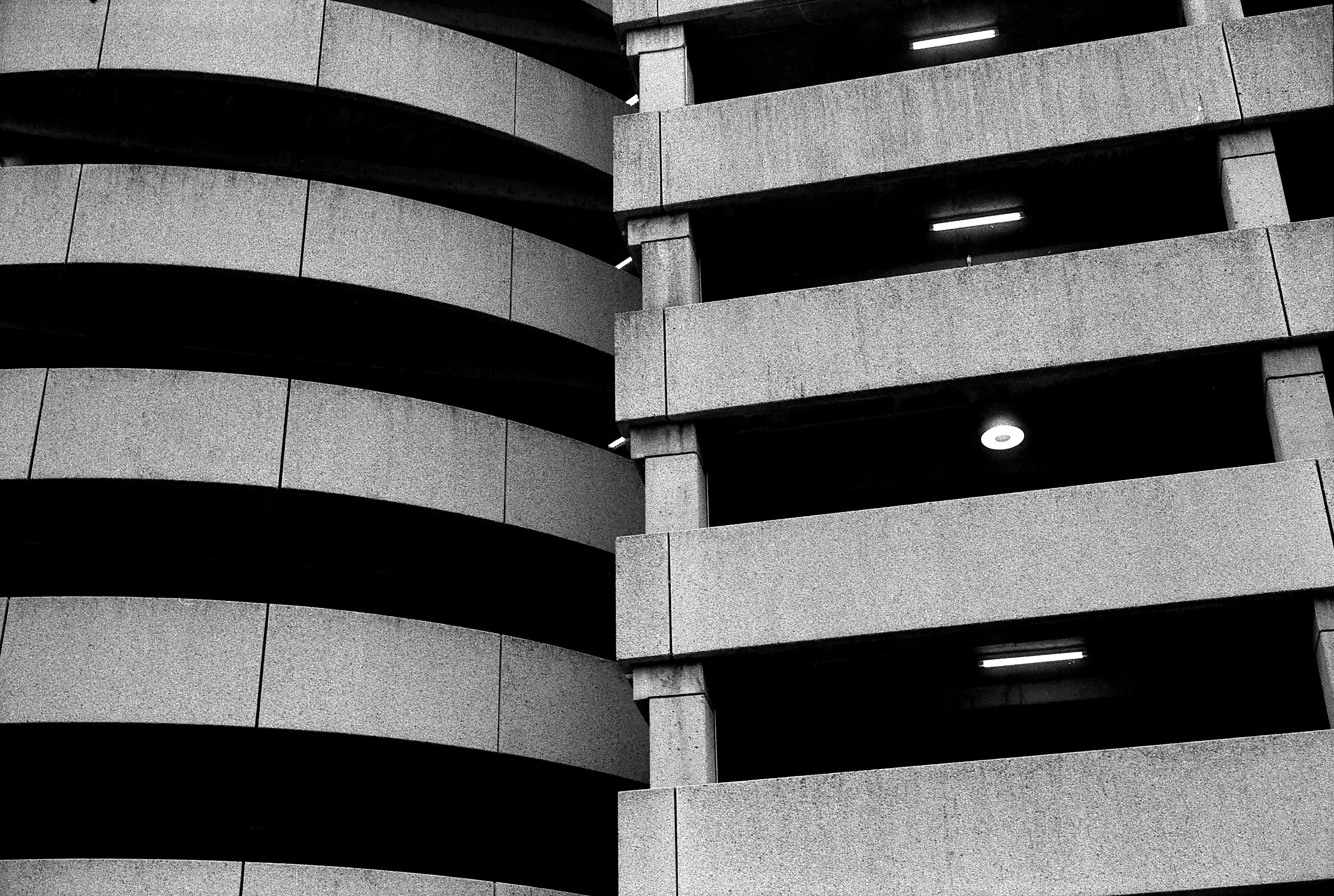 A black and white photo of a tall building