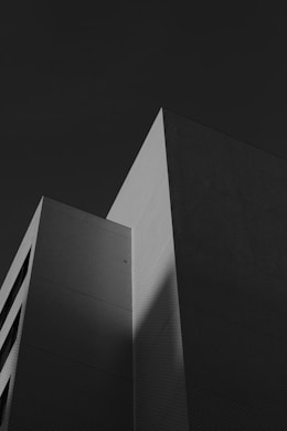 A black and white photo of a tall building