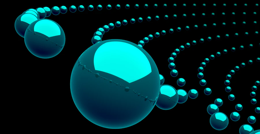 Glossy teal spheres on black