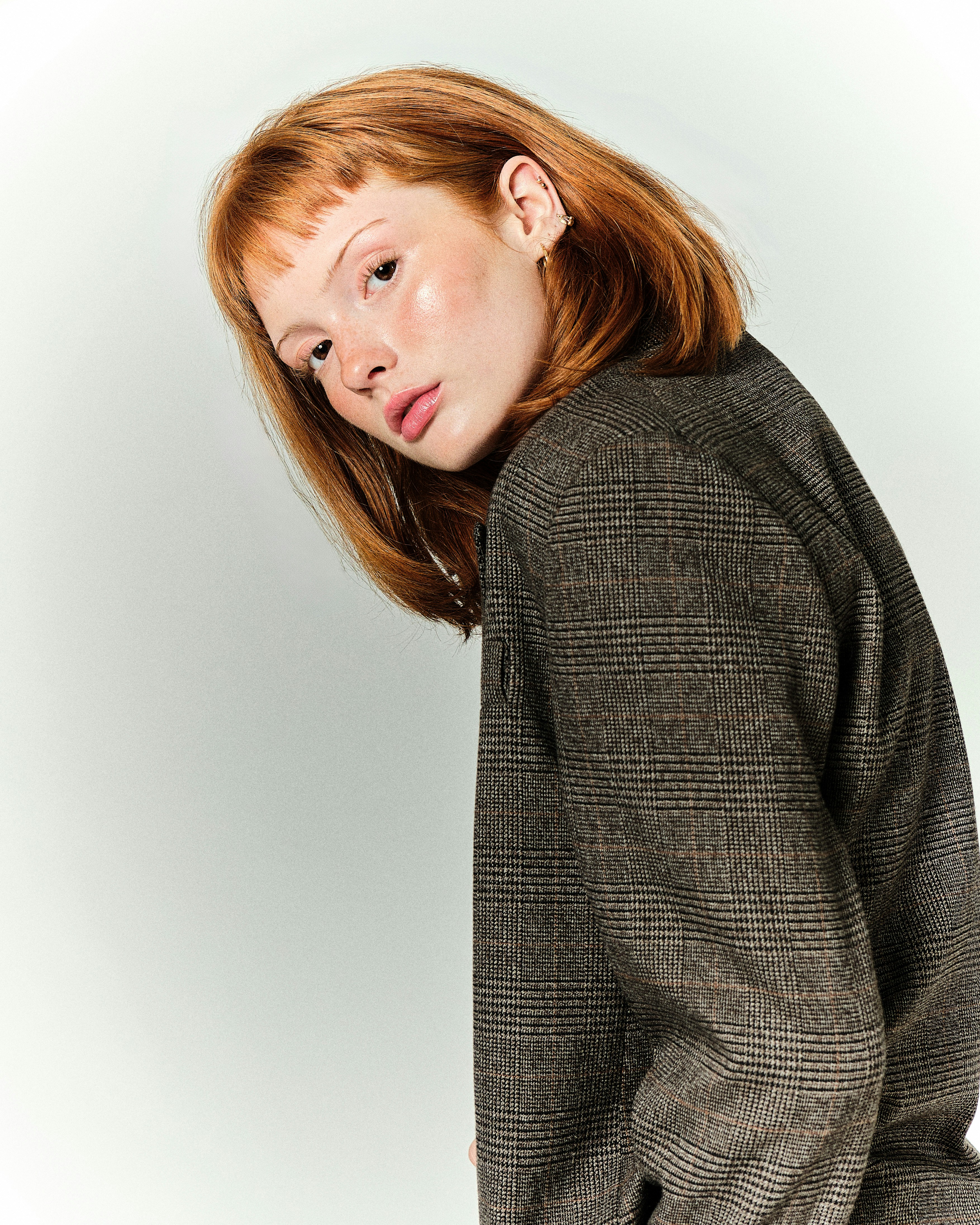 A woman with red hair is posing for a picture photo – Free Photo Image ...
