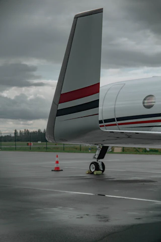 A small airplane sitting on top of an airport tarmac