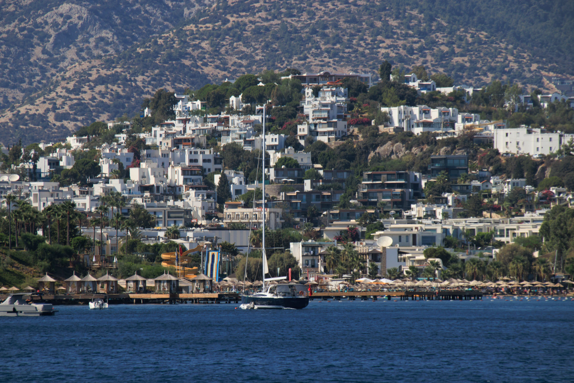 A large body of water with boats floating on top of it